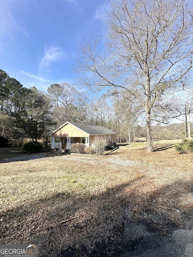 view of yard with a porch