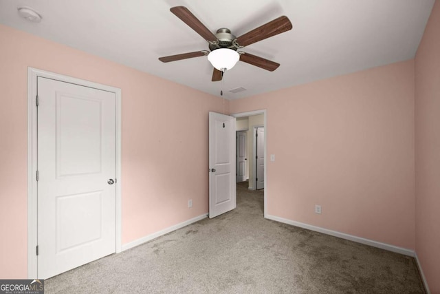 3940 Village Estates Ct, Cumming, GA 30040 - unfurnished bedroom with carpet flooring and a ceiling fan