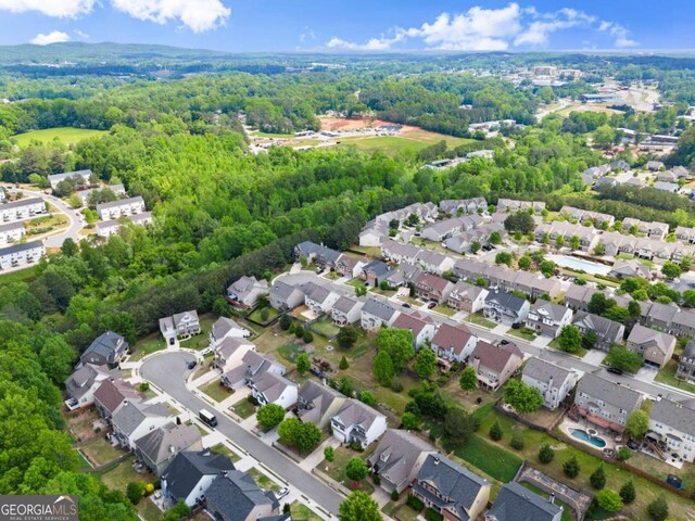 3940 Village Estates Ct, Cumming, GA 30040 - aerial perspective of suburban area featuring a heavily wooded area