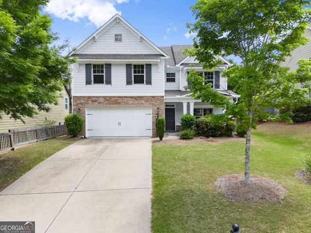 3940 Village Estates Ct, Cumming, GA 30040 - craftsman inspired home with brick siding, an attached garage, driveway, and roof with shingles