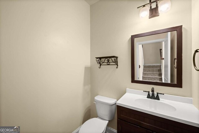 3940 Village Estates Ct, Cumming, GA 30040 - bathroom with toilet and vanity