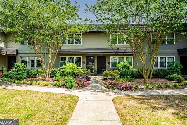 331 Lakemoore Dr NE Unit C, Atlanta, GA 30342 - view of front of home with stucco siding