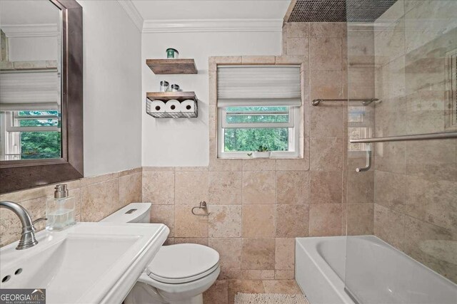 331 Lakemoore Dr NE Unit C, Atlanta, GA 30342 - full bathroom with ornamental molding, toilet, tile walls, a wainscoted wall, and a sink