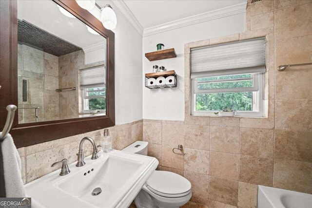 331 Lakemoore Dr NE Unit C, Atlanta, GA 30342 - full bath with a sink, toilet, a tub, tile walls, and ornamental molding