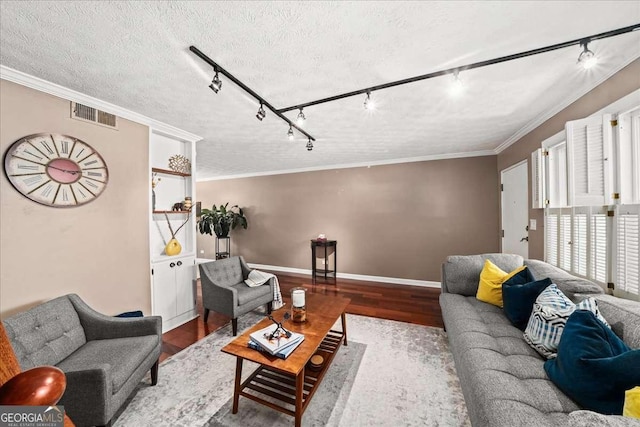 331 Lakemoore Dr NE Unit C, Atlanta, GA 30342 - living room featuring a textured ceiling, visible vents, track lighting, ornamental molding, and stairs
