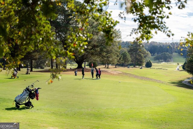 331 Lakemoore Dr NE Unit C, Atlanta, GA 30342 - view of home's community featuring view of golf course and a yard