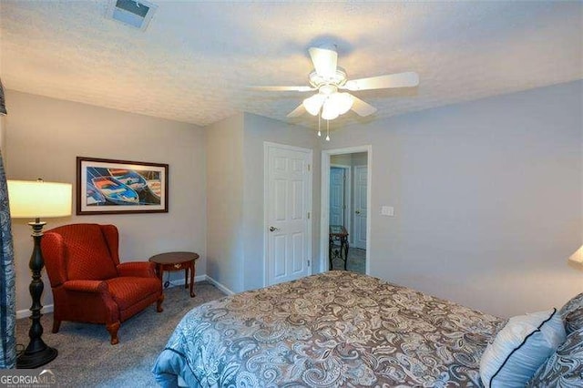 bedroom with visible vents, carpet, ceiling fan, and baseboards