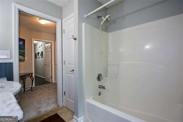 bathroom featuring shower / tub combination