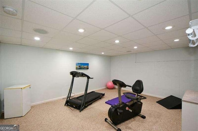 exercise area with baseboards, carpet flooring, and recessed lighting