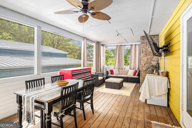 211 Phillips St, Clarkesville, GA 30523 - sunroom / solarium with outdoor lounge area, a ceiling fan, hardwood / wood-style floors, a deck, and wooden walls