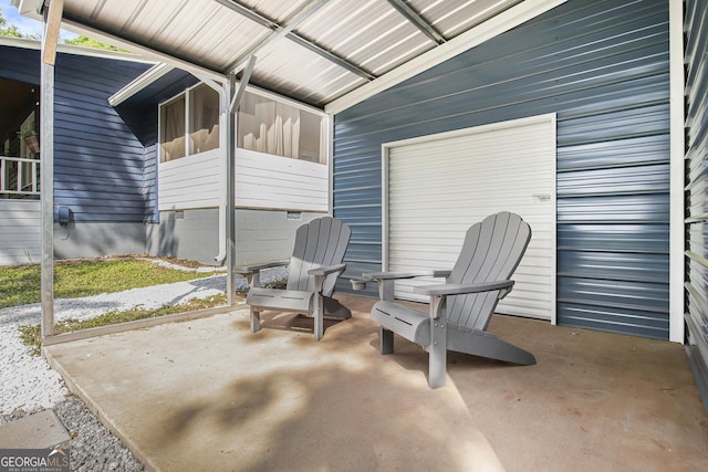 211 Phillips St, Clarkesville, GA 30523 - view of patio / terrace featuring a garage