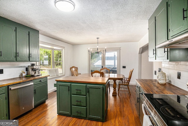 211 Phillips St, Clarkesville, GA 30523 - kitchen featuring green cabinets, wood counters, appliances with stainless steel finishes, a chandelier, and a textured ceiling