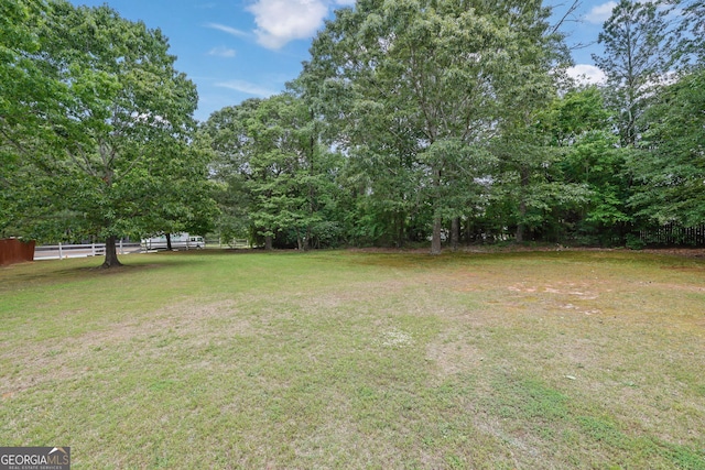 view of yard featuring fence
