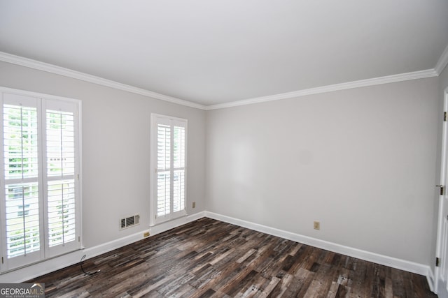 615 Woodwork Way, Roswell, GA 30076 - empty room featuring baseboards, ornamental molding, and dark wood-style flooring