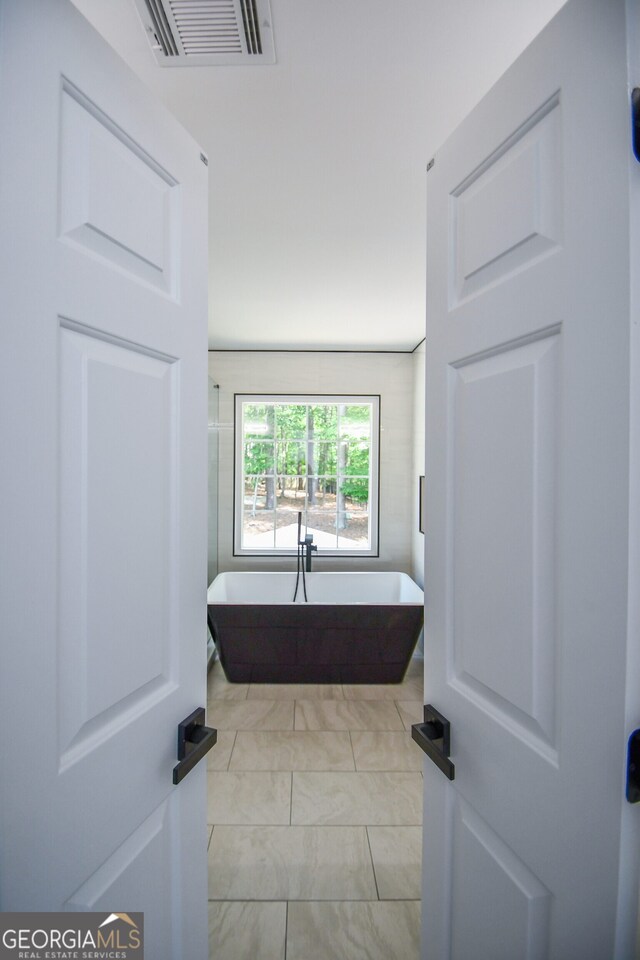 615 Woodwork Way, Roswell, GA 30076 - full bathroom featuring visible vents and a soaking tub