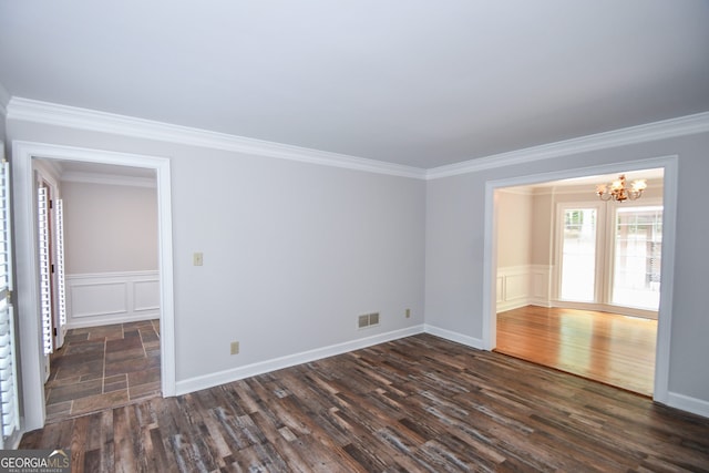 615 Woodwork Way, Roswell, GA 30076 - empty room featuring ornamental molding, dark wood finished floors, a chandelier, and visible vents