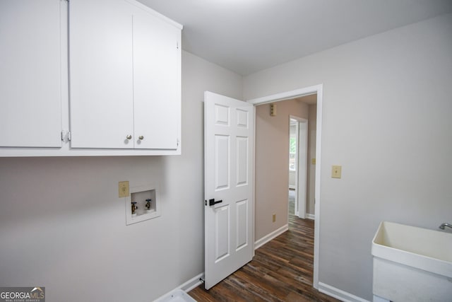 615 Woodwork Way, Roswell, GA 30076 - laundry room with cabinet space, a sink, baseboards, hookup for a washing machine, and dark wood-type flooring