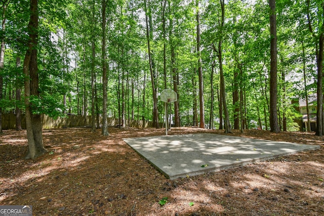 615 Woodwork Way, Roswell, GA 30076 - view of basketball court featuring basketball court and fence