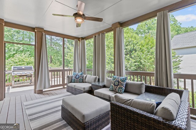 sunroom / solarium with wood-type flooring