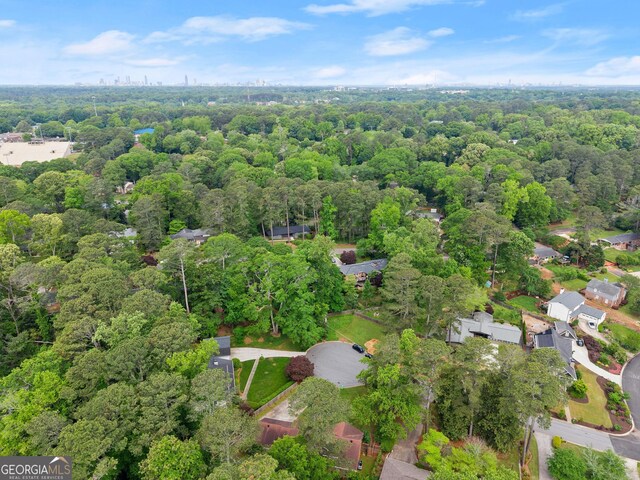 bird's eye view featuring a forest view