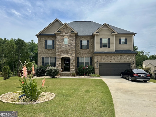 292 Aylesbury Blvd, Mcdonough, GA 30252 - craftsman-style house with concrete driveway, a garage, a front yard, and brick siding