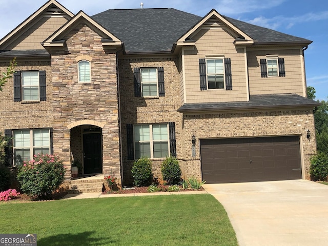 292 Aylesbury Blvd, Mcdonough, GA 30252 - craftsman inspired home featuring a front yard, a garage, concrete driveway, stone siding, and a shingled roof