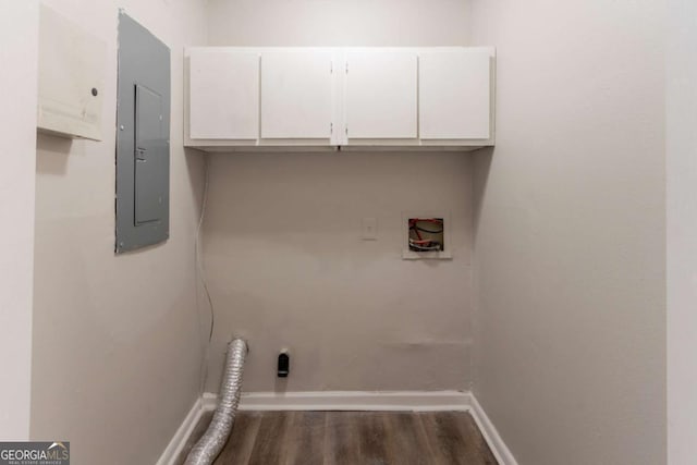 6255 Saddlewood Dr, Lithonia, GA 30058 - laundry area featuring cabinet space, washer hookup, electric panel, dark wood-style flooring, and electric dryer hookup