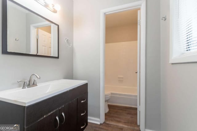 6255 Saddlewood Dr, Lithonia, GA 30058 - bathroom featuring vanity and wood finished floors