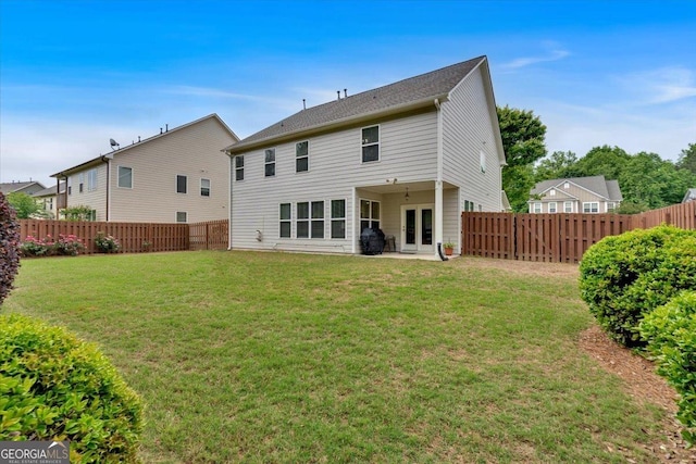 back of house featuring french doors and a patio