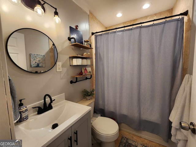 full bath with recessed lighting, vanity, toilet, and shower / tub combo