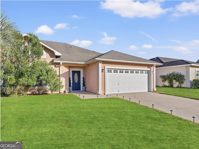 single story home with an attached garage, concrete driveway, stucco siding, and a front yard