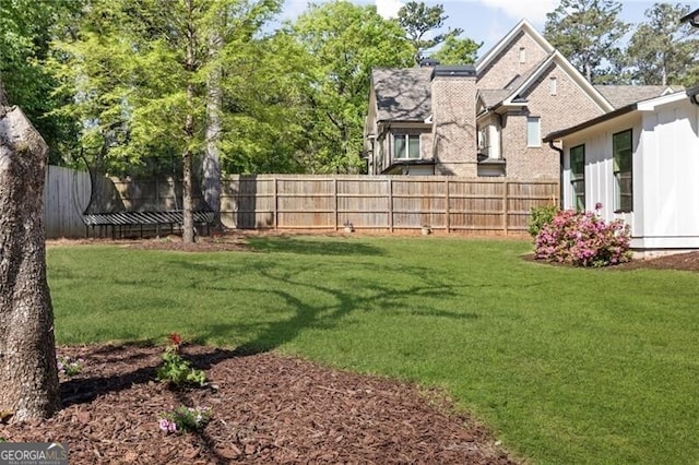 view of yard featuring fence private yard