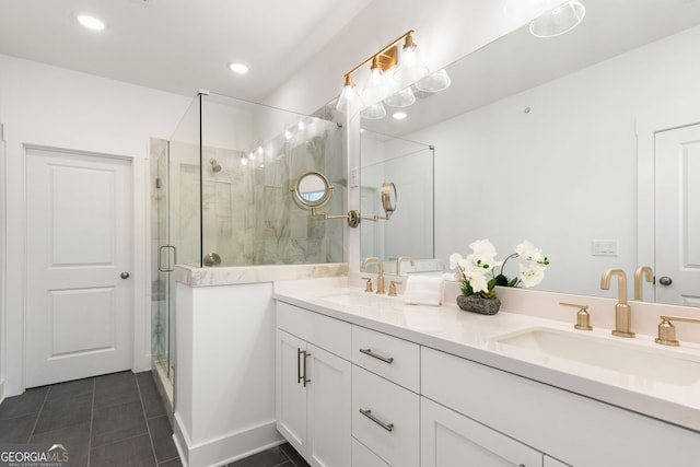 full bath featuring a shower stall, a sink, and tile patterned flooring