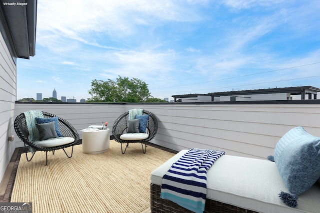 view of patio / terrace with a balcony