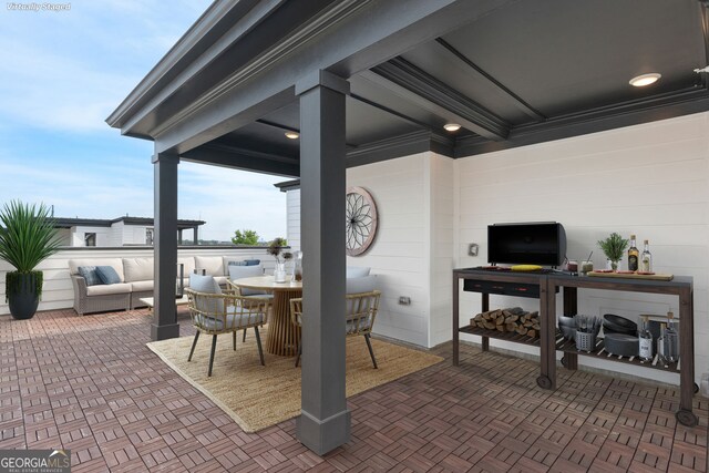 view of patio / terrace featuring an outdoor hangout area and outdoor dining space
