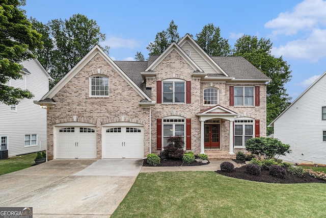 139 Ardsley Run, Canton, GA 30115 - view of front of property featuring concrete driveway, brick siding, a front yard, an attached garage, and a shingled roof