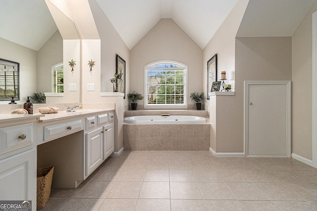 139 Ardsley Run, Canton, GA 30115 - bathroom with vanity, a bath, vaulted ceiling, and tile patterned floors