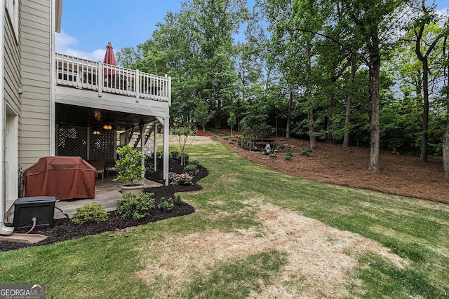 139 Ardsley Run, Canton, GA 30115 - view of grassy yard featuring a deck, stairs, and a patio