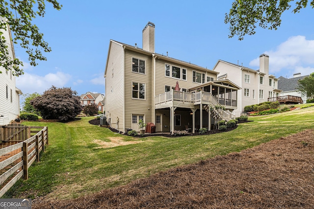 139 Ardsley Run, Canton, GA 30115 - rear view of house featuring a wooden deck and a chimney