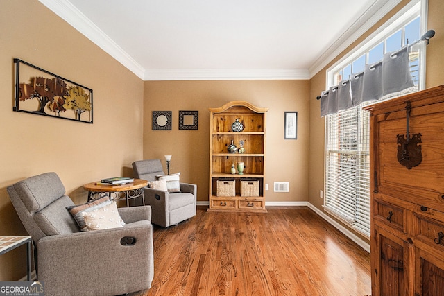 139 Ardsley Run, Canton, GA 30115 - living area featuring ornamental molding and wood finished floors