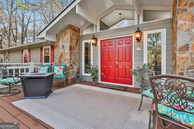 337 Andrew Bailey Rd, Sharpsburg, GA 30277 - view of exterior entry with stone siding and a porch