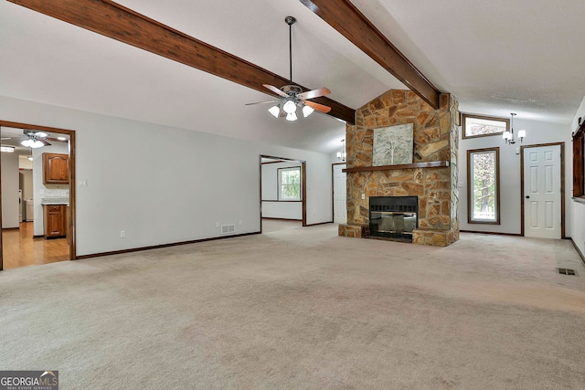 337 Andrew Bailey Rd, Sharpsburg, GA 30277 - unfurnished living room featuring ceiling fan, light carpet, a stone fireplace, and a chandelier