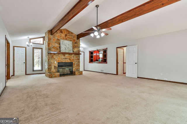 337 Andrew Bailey Rd, Sharpsburg, GA 30277 - unfurnished living room featuring carpet flooring, a ceiling fan, a fireplace, and a chandelier