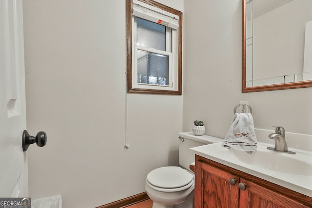 337 Andrew Bailey Rd, Sharpsburg, GA 30277 - half bathroom featuring vanity and toilet