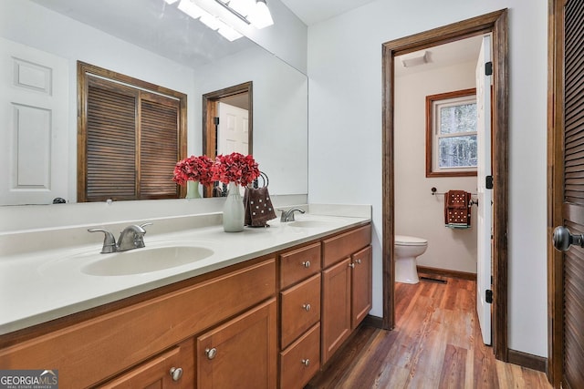 337 Andrew Bailey Rd, Sharpsburg, GA 30277 - full bathroom with double vanity and wood finished floors