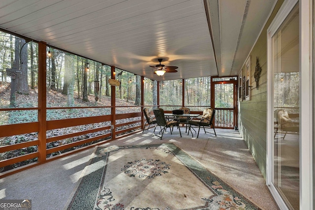 337 Andrew Bailey Rd, Sharpsburg, GA 30277 - sunroom with outdoor dining area, ceiling fan, and plenty of natural light