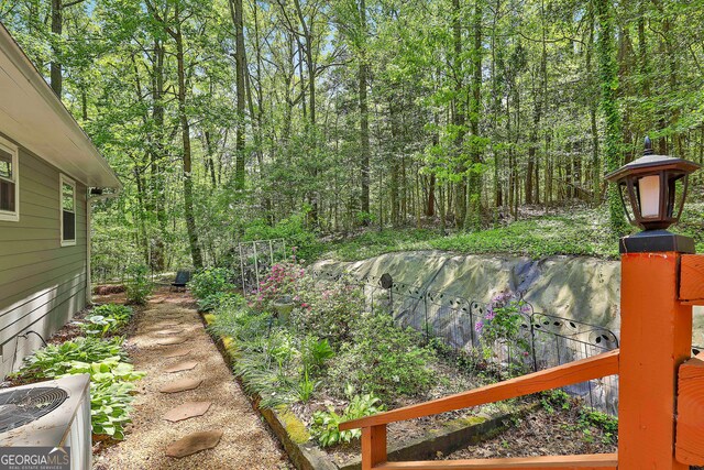 337 Andrew Bailey Rd, Sharpsburg, GA 30277 - view of yard with a wooded view