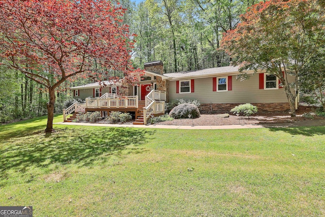 337 Andrew Bailey Rd, Sharpsburg, GA 30277 - view of front of property featuring a wooden deck, a chimney, a front yard, and stairway