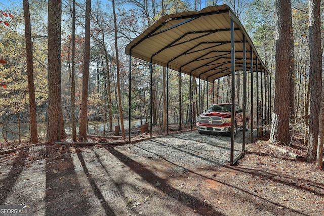 337 Andrew Bailey Rd, Sharpsburg, GA 30277 - view of parking / parking lot with a carport and driveway