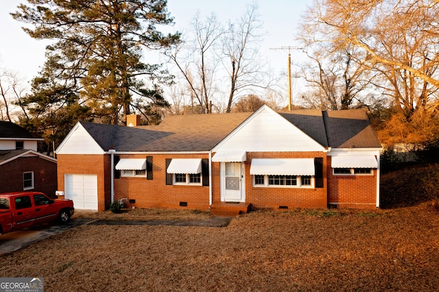 603 E Main St, Thomaston, GA 30286 - view of front facade with crawl space, brick siding, a garage, and a chimney